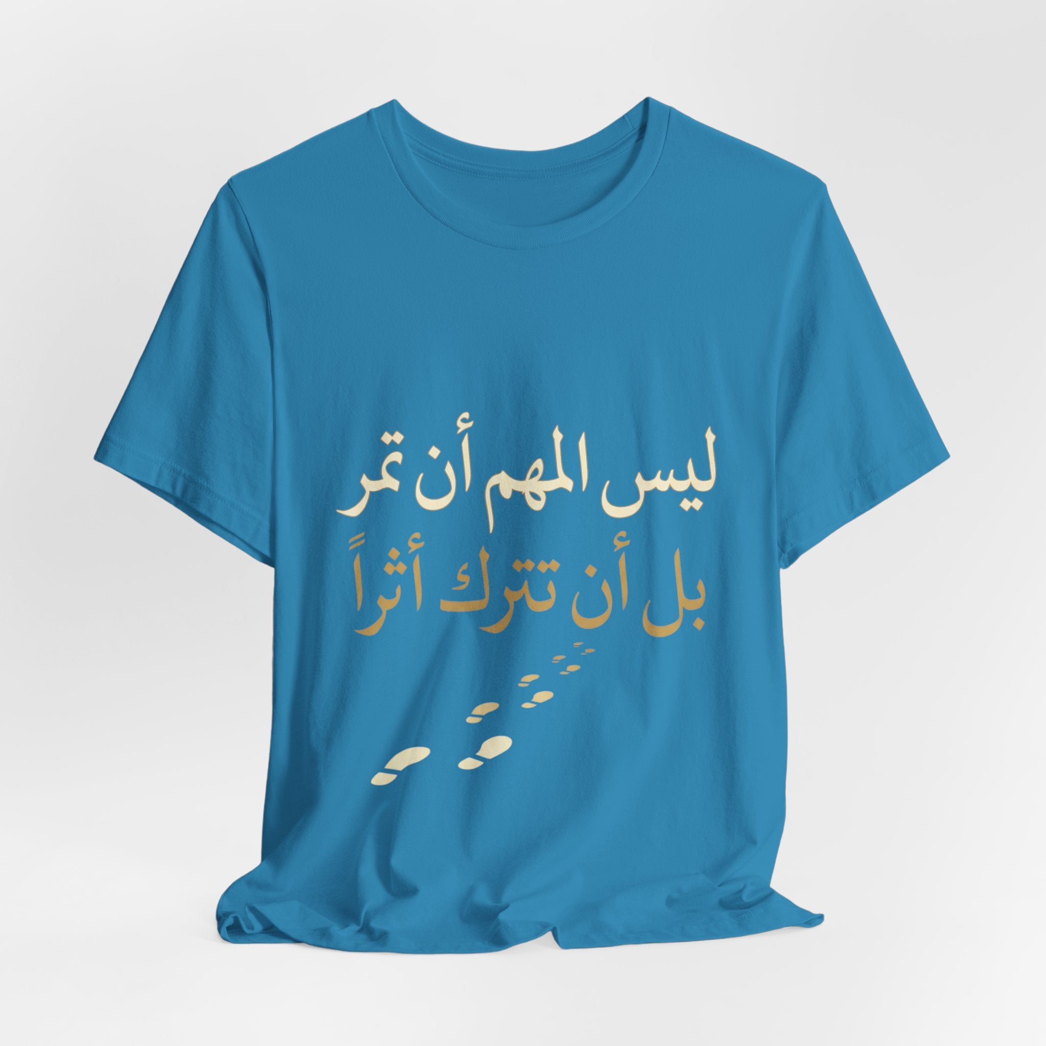 Arabic T‑Shirt — "ليس المهم أن تمر بل أن تترك أثرا" - Legacy Collection