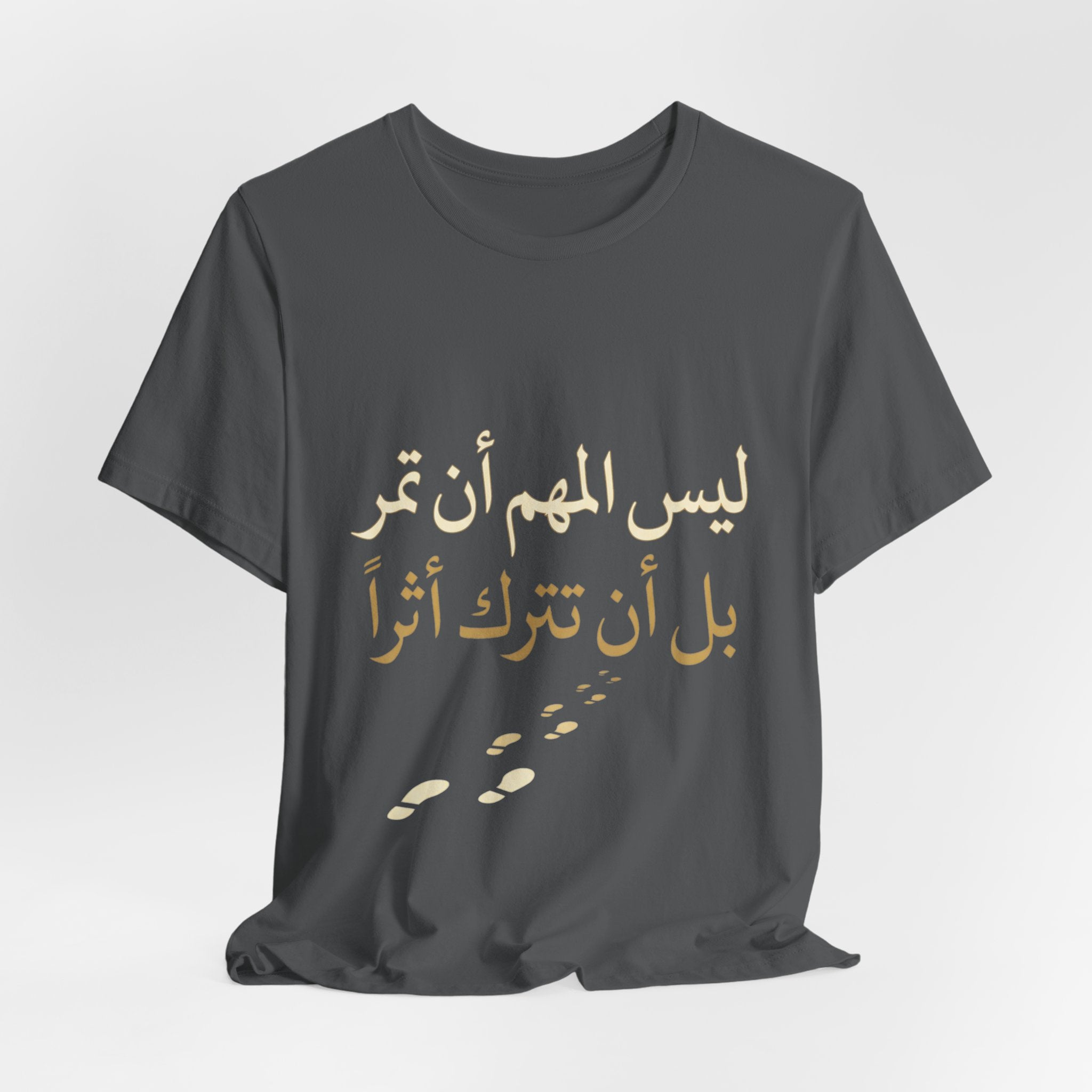 Arabic T‑Shirt — "ليس المهم أن تمر بل أن تترك أثرا" - Legacy Collection