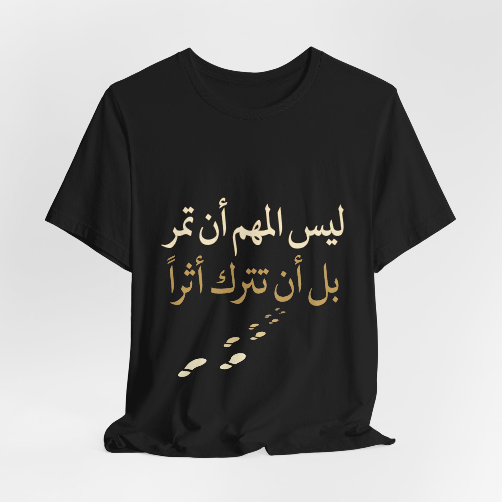 Arabic T‑Shirt — "ليس المهم أن تمر بل أن تترك أثرا" - Legacy Collection