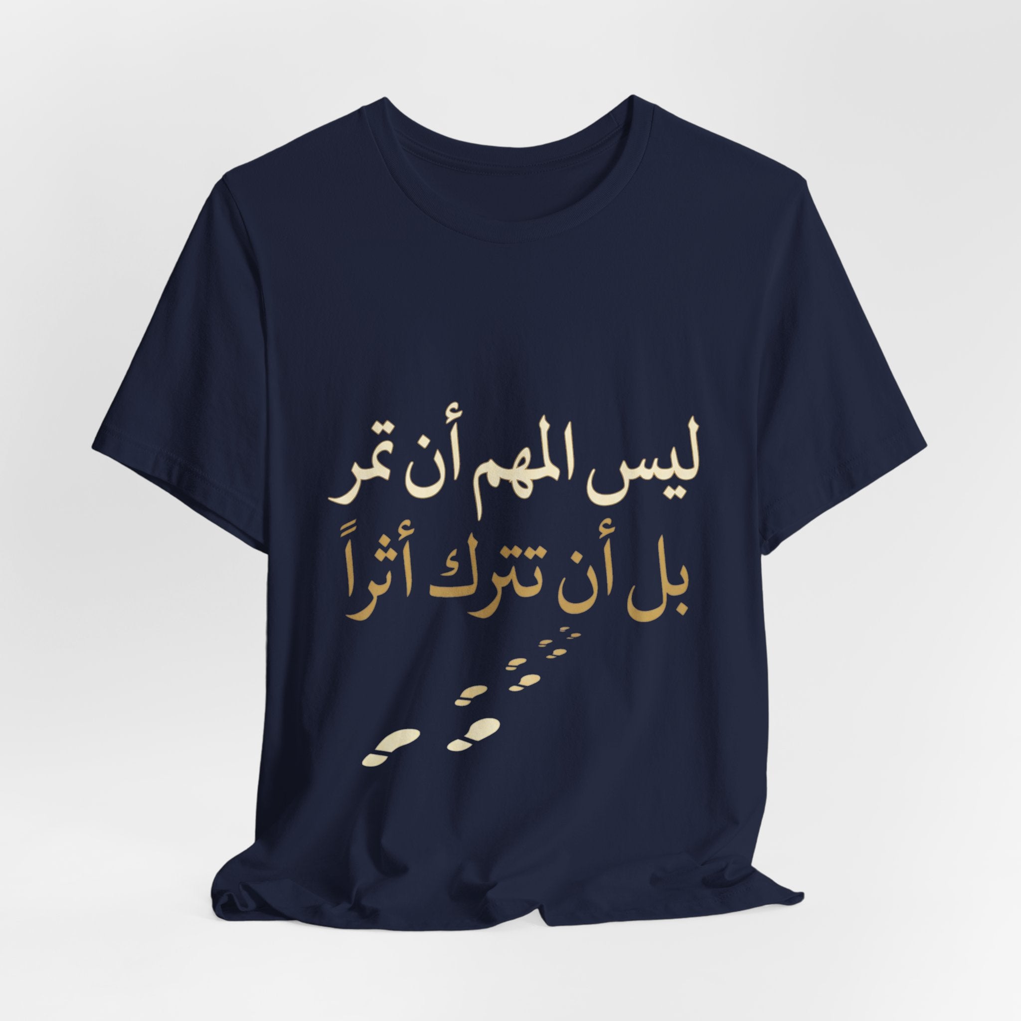 Arabic T‑Shirt — "ليس المهم أن تمر بل أن تترك أثرا" - Legacy Collection